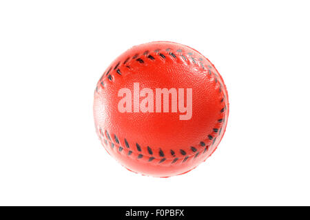 White soft ball and black baseball bat on a red background Stock Photo -  Alamy