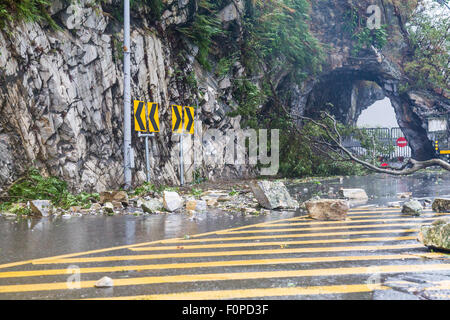 Fallen rocks and debri caused by typhoon Stock Photo
