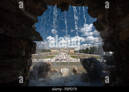 Schoenbrunn Palace and Gardens with Neptun Fountain in foreground, Vienna, Austria