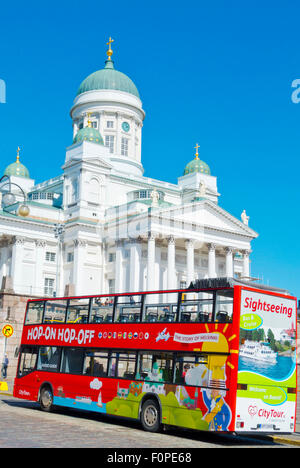 Sightseeing tour bus, in front of Tuomikirkko, the cathedral, Senaatintori square, Helsinki, Finland Stock Photo