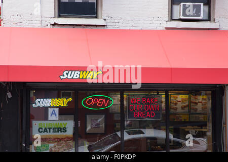 USA, New York State, New York City, Manhattan, Exterior of fast food sandwich store with neon sign. Stock Photo