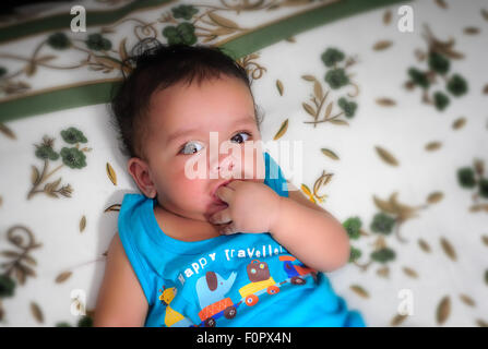 Close up portraits of a cute, beautiful Bengali baby boy in different moods with copy space Stock Photo