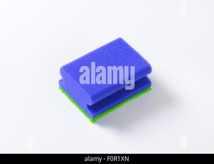 blue kitchen sponge on white background Stock Photo