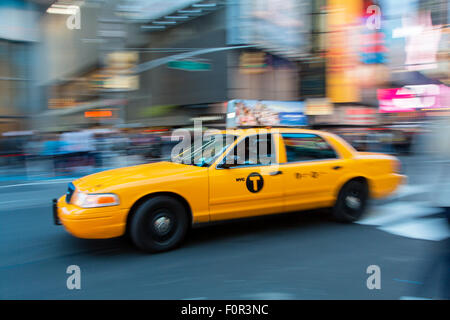 New York City, Yellow Taxi on Times Square Stock Photo