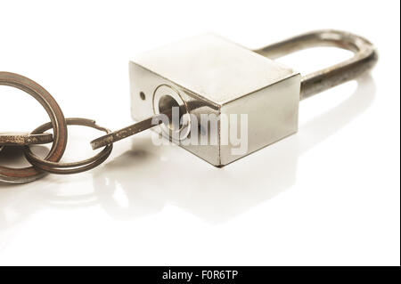 Old key in the master key isolated on white background, Selective focus Stock Photo