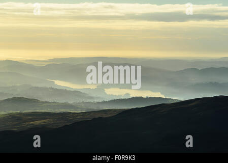 Temperature inversion over southern stretch of Windermere in the Lake District from slopes of Kentmere Pike. Stock Photo