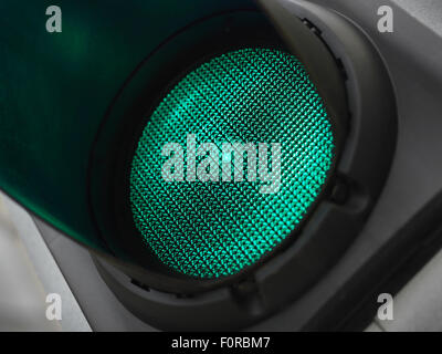 Close up shot of a green traffic light implying you are ready to go. Stock Photo