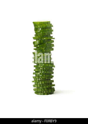 shot of a sliced, fresh cucumber stacked upright on a pure white background with copy space and a clipping path. Stock Photo