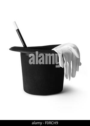 shot of a magicians top hat, gloves and magic wand isolated on a pure white background with a clipping path and copy space. Stock Photo