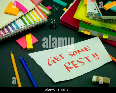 Somebody Left the Message on Your Working Desk; Get Some Rest Stock Photo