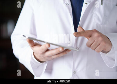 Fragment of a man in a doctor's coat Stock Photo