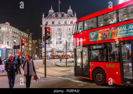 No 38 London Bus Approaching Piccadilly Circus, at Night , London Stock Photo