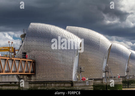 The Thames Barrier, one of the largest movable flood barriers in the world and helps prevent London from being flooded by high tides and storm surges Stock Photo