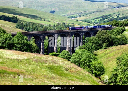 Northern Rail Train Crossing the Dent Head Viaduct in Dentdale Yorkshire Dales Cumbria England Stock Photo