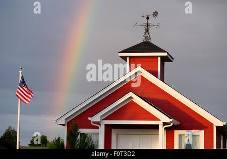 Rainbow over an old one room schoolhouse in Colorado. Stock Photo