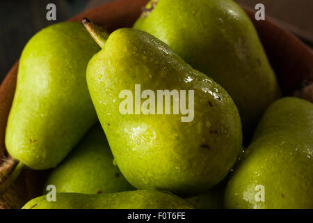 Green Organic Bartlett Pears in a Bowl Stock Photo