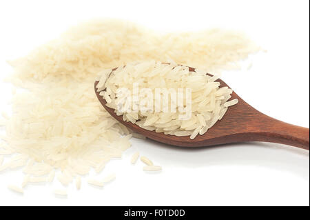 Rice,White rice in wooden spoon isolated on white background, selective focus Stock Photo