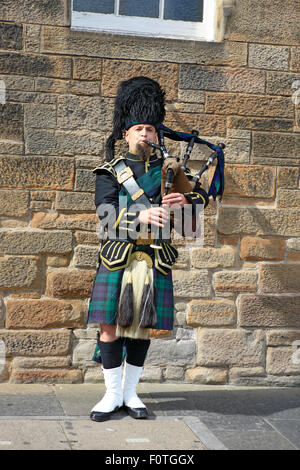 Scottish piper with tartan kilt sporran busby bagpipes at the opening ...
