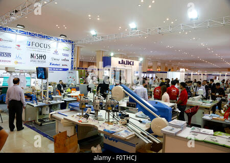 Phnom Penh. 21st Aug, 2015. Photo taken on Aug. 21, 2015 shows machines for textile and garment displayed at an exhibition in Phnom Penh, Cambodia. The 5th International Garment and Industrial Machinery Exhibition was held here on Friday. Credit:  Phearum/Xinhua/Alamy Live News Stock Photo