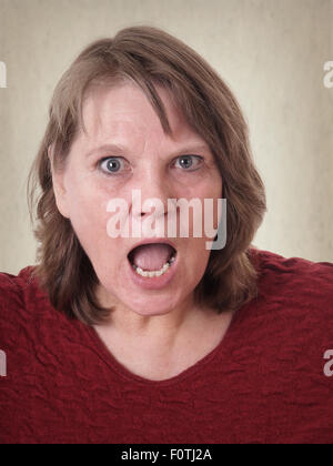 senior woman in shock Stock Photo