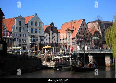 Cafes at river Ilmenau,   Stintmarkt, old harbour quarter, Lueneburg, Lüneburg, Lower Saxony, Germany, Europe Stock Photo