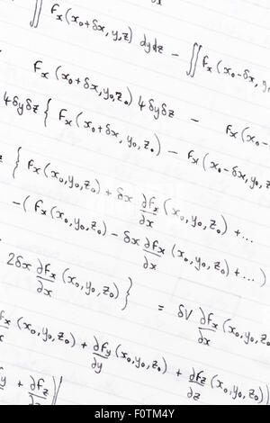 Hand written study notes with equations for divergence of vector fields Stock Photo