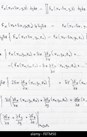 Study notes written on lined paper with scientific formulae for divergence of vector fields Stock Photo