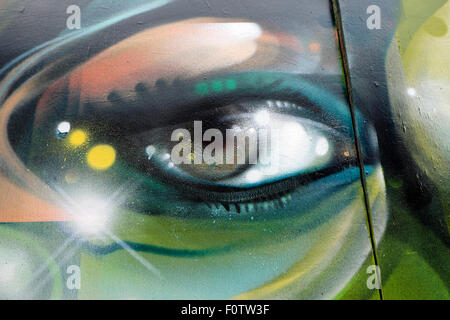 Closeup detail of an eye painted on wall graffiti in Shoreditch East London, UK   KATHY DEWITT Stock Photo