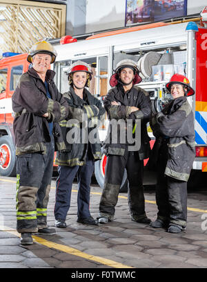 Confident Firefighters Standing Arms Crossed Stock Photo