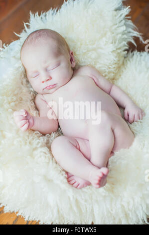 Little newborn baby sleeps tight 15 days Stock Photo