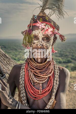 Portrait of mature woman from Karo tribe wearing traditional costume, Ethiopia, Africa Stock Photo