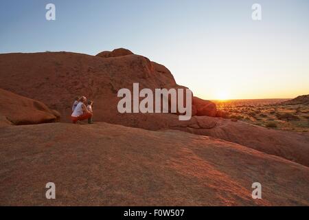 Mother and children looking at view, Swakopmund, Erongo, Namibia Stock Photo