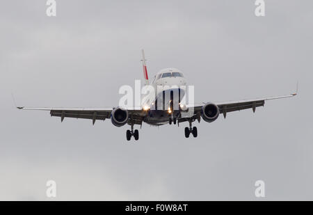 A British Airways BA CityFlyer Embraer ERJ-170 registration G-LCYF taxis for take off from London City Airport LCY Stock Photo