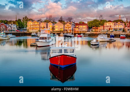 Rockport Harbor - Colorful fishing and pleasure boats docked at Bradley Wharf during first light at Rockport, Massachusetts. Stock Photo