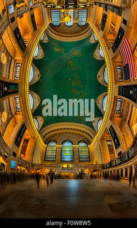 This vertical panorama shows a unique perspective of the main concourse of historic Grand Central Terminal in New York City. Stock Photo