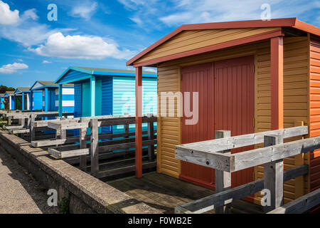 Colourful beach huts in the Kentish coastal resort of Whitstable. Stock Photo