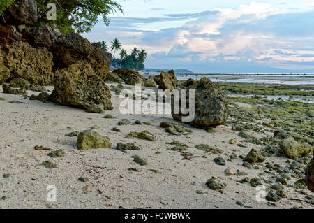 Rock Formations in the Sea. When waters recede outwards, rock formations are visible for everyone to behold Stock Photo