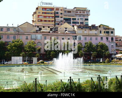 Tirana, Albania. Residential building and fountain in the city center. Stock Photo
