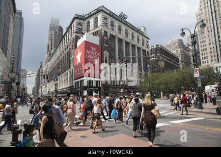 The always busy intersection of 34th St. & Broadway at Macy's Dept. Store. NYC. Stock Photo