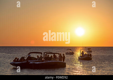 Ibiza, watching the sunset on sunset strip in San Antonio. Cafe Del Mar & Cafe Mambo Stock Photo