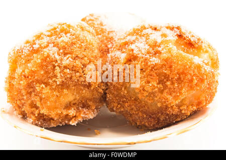 Dumplings with plums isolated on white. Stock Photo