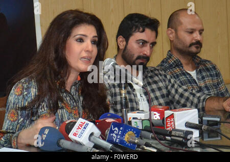 Pakistani famous movie actress, Resham gestures during the press conference of her upcoming movie, 'Swaa Rangi' at Lahore Press Club. ( Photo by Rana Sajid Hussain) Stock Photo