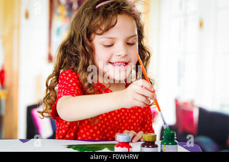 Kid Hands Painting at the Table with Art Supplies, Top View Stock Photo -  Image of childhood, child: 146297712