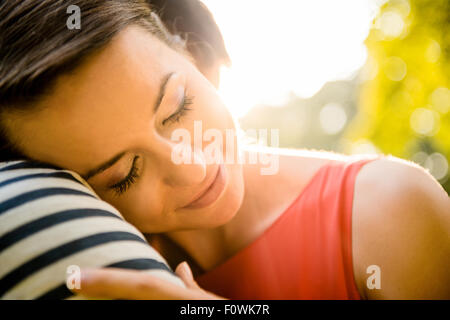 Intimate moments - young couple embracing and hugging in nature Stock Photo