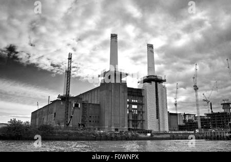 Battersea Power Station redevelopment and adjoining new residential project under construction, seen from River Thames, London Stock Photo