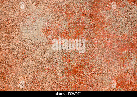 A background from wall with red plaster Stock Photo
