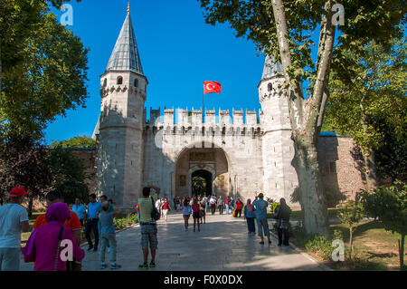 Istanbul, Turkey - August 19, 2015: Tourists entering the Gate of Salutation of Topkapi Palace Stock Photo