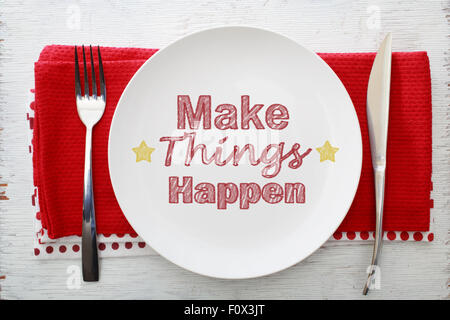 Inspirational Meal Make Things Happen with Table Settings Stock Photo