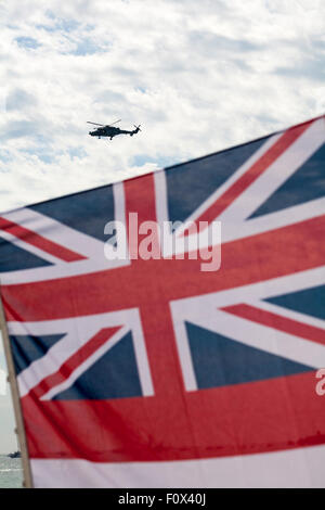 Bournemouth, UK. 22 August 2015. The Black Cats helicopter display team perform at the Bournemouth Air Festival - helicopter over Union Jack flag Credit:  Carolyn Jenkins/Alamy Live News Stock Photo