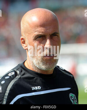 Hanover, Germany. 22nd Aug, 2015. Hannover's head coach Michael Frontzeck prior to the German Bundesliga soccer match between Hannover 96 and Bayer 04 Leverkusen at the HDI-Arena in Hanover, Germany, 22 August 2015. Photo: PETER STEFFEN/dpa (EMBARGO CONDITIONS - ATTENTION: Due to the accreditation guidelines, the DFL only permits the publication and utilisation of up to 15 pictures per match on the internet and in online media during the match.)/dpa/Alamy Live News Stock Photo